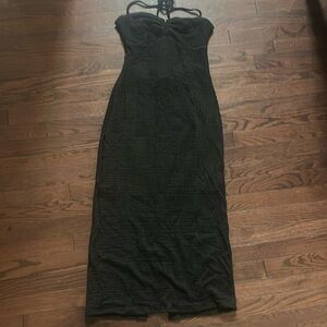 Black stretchy dress with tie neck.